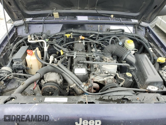 1999 Jeep Cherokee Sport с VIN 1J4FT68S6XL586023, выставлен на аукционе Copart как лот 58907195 с пробегом 391 932 миль миль и Списание • Salvage title. История ставок и продаж доступна на DreamBid. Изображение 12.