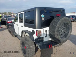 2017 Jeep Wrangler Unlimited Sport with VIN 1C4HJWDG1HL580136, listed as a IAAI auction lot 41193905 with 63,875 mi miles. Bid and sale history available at carsss.com. Image 3.