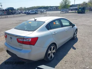 2014 Kia Rio EX with VIN KNADN4A34E6352924, listed as a IAAI auction lot 42072886 with 1 mi miles. Bid and sale history available at carsss.com. Image 4.
