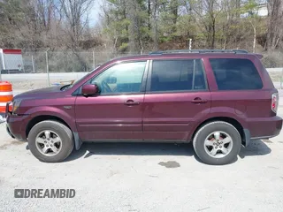 2007 Honda Pilot EX-L with VIN 5FNYF18587B021312, listed as a IAAI auction lot 41801006 with 261,842 mi miles. Bid and sale history available at carsss.com. Image 14.