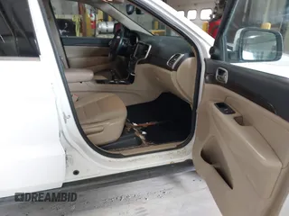 2014 Jeep Grand Cherokee Laredo with VIN 1C4RJFAG4EC309401, listed as a IAAI auction lot 41996233 with 243,541 mi miles and . Bid and sale history available at DreamBid. Image 5.