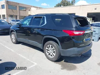 2021 Chevrolet Traverse LT Cloth with VIN 1GNERGKW9MJ162089, listed as a IAAI auction lot 41944248 with 99,586 mi miles. Bid and sale history available at carsss.com. Image 3.