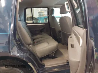 2003 Mercury Mountaineer Convenience z VIN 4M2ZU86W03UJ16828, wystawiony jako IAAI lot #41580919 z przebiegiem 148 968 mil mil oraz . Historia ofert i sprzedaży dostępna na DreamBid. Obrazek 8.