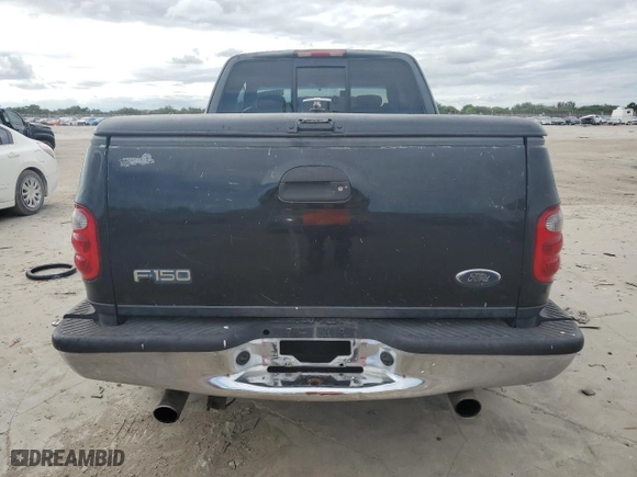 2002 Ford F-150 XL with VIN 2FTRX07222CA18022, listed as a Copart auction lot 80419784 with 283,975 mi miles and Salvage Title. Bid and sale history available at carsss.com. Image 6.