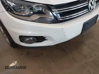 2016 Volkswagen Tiguan S with VIN WVGBV7AX0GW532236, listed as a IAAI auction lot 41610575 with 104,193 mi miles and . Bid and sale history available at DreamBid. Image 6.