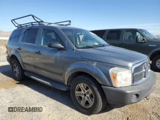 2006 Dodge Durango SXT with VIN 1D4HD38K16F128304, listed as a Copart auction lot 58182694 with 103,374 mi miles and Salvage title. Bid and sale history available at DreamBid. Image 4.