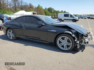 2015 BMW 6 Series z VIN WBALY1C57FDZ73541, wystawiony jako Copart lot #57294034 z przebiegiem 136 357 mil mil oraz Czysty tytuł • Clean title. Historia ofert i sprzedaży dostępna na DreamBid. Obrazek 4.