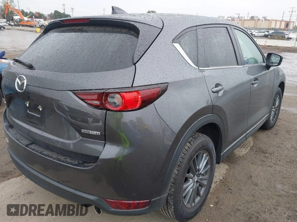 2021 Mazda CX-5 Touring with VIN JM3KFACM6M0480487, listed as a IAAI auction lot 41731646 with 26,951 mi miles and . Bid and sale history available at carsss.com. Image 4.