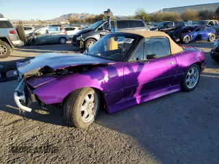 1993 Mazda MX-5 Miata z VIN JM1NA3518P0406902, wystawiony jako Copart lot #88813885 z przebiegiem 209 192 mil mil oraz Szkoda całkowita • Salvage title. Historia ofert i sprzedaży dostępna na DreamBid. Obrazek 1.