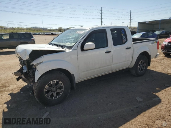 2018 Nissan Frontier Pro-4X with VIN 1N6AD0EV1JN715111, listed as a Copart auction lot 54012255 with 127,409 mi miles and Salvage title. Bid and sale history available at DreamBid. Image 1.