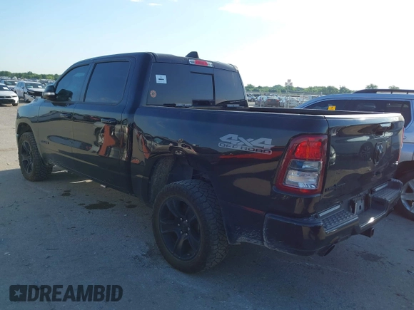 2021 Ram 1500 Big Horn with VIN 1C6SRFFT1MN520081, listed as a IAAI auction lot 42187257 with 186,011 mi miles and . Bid and sale history available at DreamBid. Image 3.