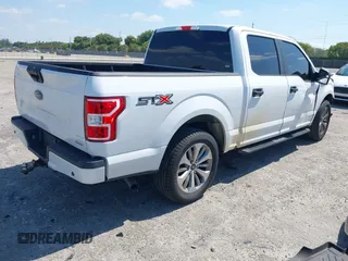 2018 Ford F-150 XL with VIN 1FTEW1CP8JKE91006, listed as a IAAI auction lot 42123840 with 76,806 mi miles and . Bid and sale history available at DreamBid. Image 4.