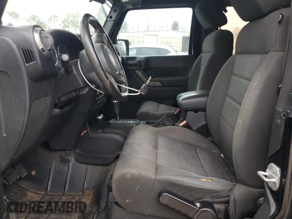2012 Jeep Wrangler Sport with VIN 1C4GJWAG6CL167329, listed as a Copart auction lot 88895815 with 147,448 mi miles and Clean Title. Bid and sale history available at DreamBid. Image 7.