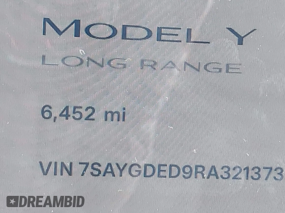 2024 Tesla Model Y with VIN 7SAYGDED9RA321373, listed as a IAAI auction lot 42228491 with 6,452 mi miles and . Bid and sale history available at DreamBid. Image 14.