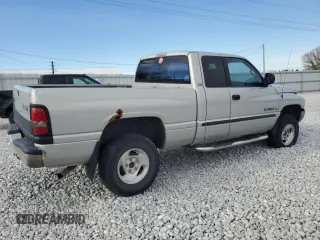 2001 Dodge 1500 z VIN 3B7HF13Z11G165621, wystawiony jako Copart lot #52585255 z przebiegiem 232 673 mil mil oraz Szkoda całkowita • Salvage title. Historia ofert i sprzedaży dostępna na DreamBid. Obrazek 3.