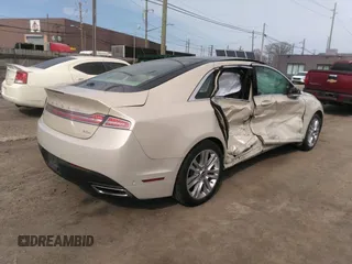 2014 Lincoln MKZ Hybrid with VIN 3LN6L2LU2ER805061, listed as a IAAI auction lot 42022156 with Not provided miles and . Bid and sale history available at DreamBid. Image 4.