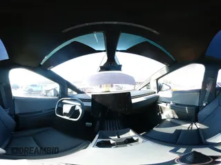 2024 Tesla Cybertruck z VIN 7G2CEHEDXRA022640, wystawiony jako IAAI lot #41423630 z przebiegiem 18 474 mil mil oraz . Historia ofert i sprzedaży dostępna na DreamBid. Obrazek 23.