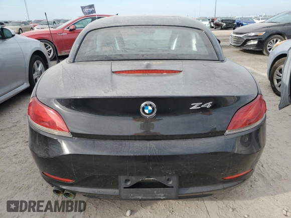 2009 BMW Z4 sDrive30i with VIN WBALM53559E161382, listed as a Copart auction lot 74890204 with 0 mi miles and Salvage Title. Bid and sale history available at carsss.com. Image 6.