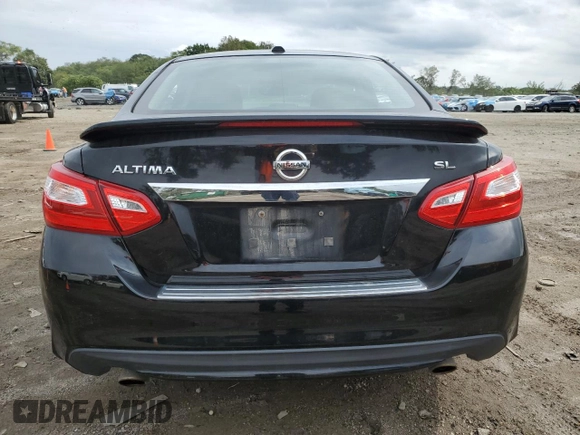 2016 Nissan Altima SV with VIN 1N4AL3AP1GC272239, listed as a Copart auction lot 74732064 with 67,541 mi miles and Salvage Title. Bid and sale history available at DreamBid. Image 6.