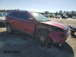 2014 Jeep Cherokee Latitude with VIN 1C4PJLCB2EW171914, listed as a Copart auction lot 41882175 with 146,286 mi miles and Salvage Title. Bid and sale history available at DreamBid. Image 4.