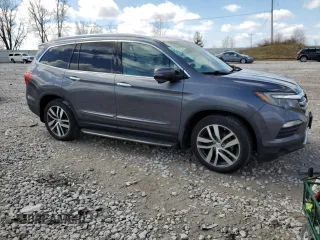 2016 Honda Pilot Touring with VIN 5FNYF6H98GB035114, listed as a Copart auction lot 49123905 with 117,591 mi miles and Clean Title. Bid and sale history available at carsss.com. Image 4.