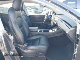 2021 Tesla Model Y Long Range with VIN 5YJYGDEE5MF191142, listed as a IAAI auction lot 41448514 with 71,626 mi miles. Bid and sale history available at carsss.com. Image 5.