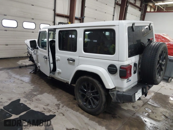 2021 Jeep Wrangler Unlimited Sahara with VIN 1C4JJXP60MW830307, listed as a IAAI auction lot 41869863 with 37,201 mi miles and . Bid and sale history available at DreamBid. Image 3.
