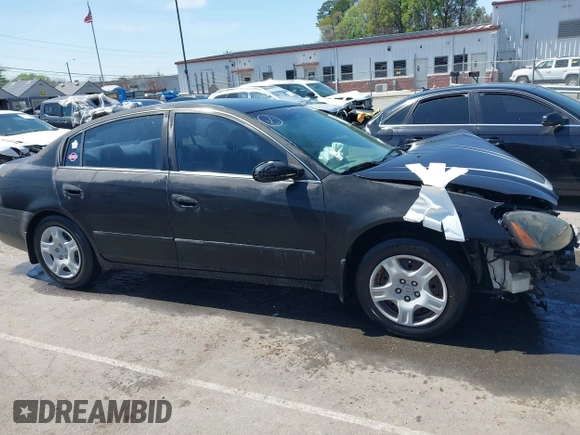 2003 Nissan Altima S with VIN 1N4AL11D03C129562, listed as a IAAI auction lot 41911150 with 205,862 mi miles. Bid and sale history available at carsss.com. Image 13.