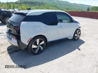 2015 BMW i3 z VIN WBY1Z4C58FV501754, wystawiony jako IAAI lot #42220253 z przebiegiem 59 022 mil mil oraz . Historia ofert i sprzedaży dostępna na DreamBid. Obrazek 4.
