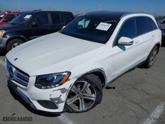 2018 Mercedes-Benz GLC with VIN WDC0G4JB1JV054358, listed as a IAAI auction lot 41656531 with 74,992 mi miles. Bid and sale history available at carsss.com. Image 2.