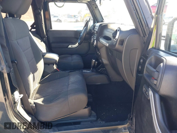 2012 Jeep Wrangler Arctic with VIN 1C4AJWBG7CL170079, listed as a IAAI auction lot 41004260 with 83,408 mi miles and . Bid and sale history available at DreamBid. Image 5.