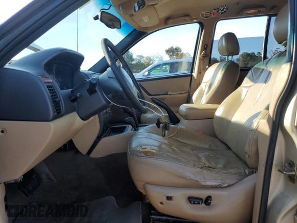 1999 Jeep Grand Cherokee Laredo z VIN 1J4GW58NXXC704719, wystawiony jako Copart lot #49546395 z przebiegiem 276 716 mil mil oraz Czysty tytuł • Clean title. Historia ofert i sprzedaży dostępna na DreamBid. Obrazek 7.