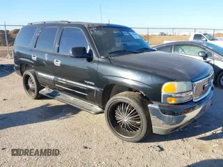 2003 GMC Yukon SLE z VIN 1GKEK13V13R235749, wystawiony jako IAAI lot #41668905 z przebiegiem 149 480 mil mil oraz . Historia ofert i sprzedaży dostępna na DreamBid. Obrazek 1.