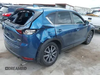 2018 Mazda CX-5 Touring z VIN JM3KFACM5J1442416, wystawiony jako IAAI lot #42093137 z przebiegiem 65 102 mil mil oraz . Historia ofert i sprzedaży dostępna na DreamBid. Obrazek 4.