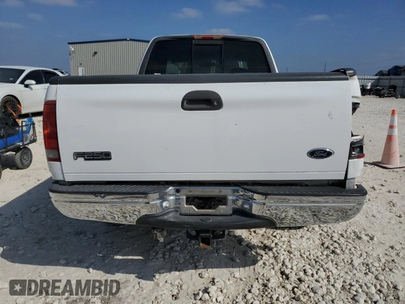 1999 Ford F-250 с VIN 1FTRX27L8XKA26097, выставлен на аукционе Copart как лот 43270015 с пробегом 201 792 миль миль и Списание • Salvage title. История ставок и продаж доступна на DreamBid. Изображение 6.