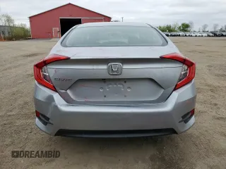 2017 Honda Civic LX z VIN 2HGFC2F51HH011825, wystawiony jako Copart lot #56276965 z przebiegiem 136 266 mil mil oraz Szkoda całkowita • Salvage title. Historia ofert i sprzedaży dostępna na DreamBid. Obrazek 6.