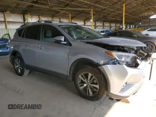 2018 Toyota RAV4 XLE with VIN JTMRFREV1JJ213808, listed as a Copart auction lot 54437805 with 56,972 mi miles and Salvage Title. Bid and sale history available at DreamBid. Image 4.
