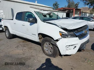 2020 Chevrolet Colorado 4WD Work Truck z VIN 1GCGTBEN2L1223483, wystawiony jako IAAI lot #41339810 z przebiegiem 75 696 mil mil oraz . Historia ofert i sprzedaży dostępna na DreamBid. Obrazek 1.