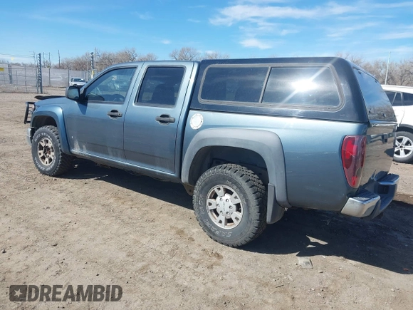 2006 GMC Canyon SLE1 with VIN 1GTDT136768277608, listed as a IAAI auction lot 41884392 with 128,834 mi miles. Bid and sale history available at carsss.com. Image 3.
