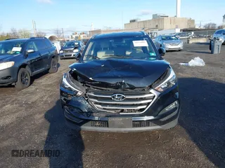 2018 Hyundai Tucson SEL z VIN KM8J3CA47JU689409, wystawiony jako IAAI lot #41931096 z przebiegiem 41 746 mil mil oraz . Historia ofert i sprzedaży dostępna na DreamBid. Obrazek 13.