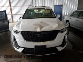 2021 Cadillac XT6 AWD Sport z VIN 1GYKPHRSXMZ195978, wystawiony jako Copart lot #80886314 z przebiegiem Nie podano mil oraz Szkoda całkowita • Salvage title. Historia ofert i sprzedaży dostępna na DreamBid. Obrazek 5.
