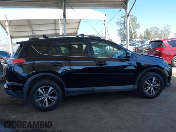 2018 Toyota RAV4 XLE with VIN 2T3WFREV2JW502622, listed as a IAAI auction lot 42327598 with 94,997 mi miles and . Bid and sale history available at DreamBid. Image 13.