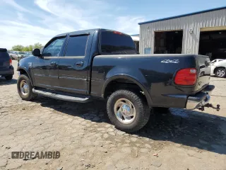 2003 Ford F-150 XLT with VIN 1FTRW08L63KB47470, listed as a Copart auction lot 50400055 with 223,859 mi miles and Salvage Title. Bid and sale history available at carsss.com. Image 2.