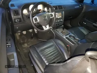 2014 Dodge Challenger R/T Plus z VIN 2C3CDYBT5EH160826, wystawiony jako Copart lot #82748844 z przebiegiem 160 152 mil mil oraz Szkoda całkowita • Salvage title. Historia ofert i sprzedaży dostępna na DreamBid. Obrazek 8.