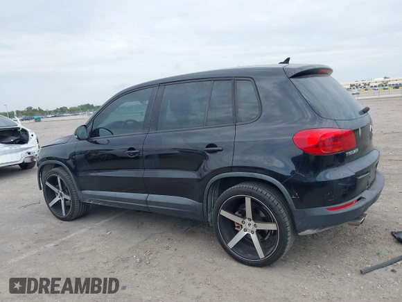 2014 Volkswagen Tiguan SE z VIN WVGAV3AXXEW535128, wystawiony jako IAAI lot #41882213 z przebiegiem 103 161 mil mil oraz . Historia ofert i sprzedaży dostępna na DreamBid. Obrazek 14.