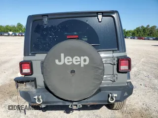 2018 Jeep Wrangler Unlimited Sport S with VIN 1C4HJXDG8JW227693, listed as a Copart auction lot 56694565 with 134,638 mi miles and Salvage title. Bid and sale history available at DreamBid. Image 6.