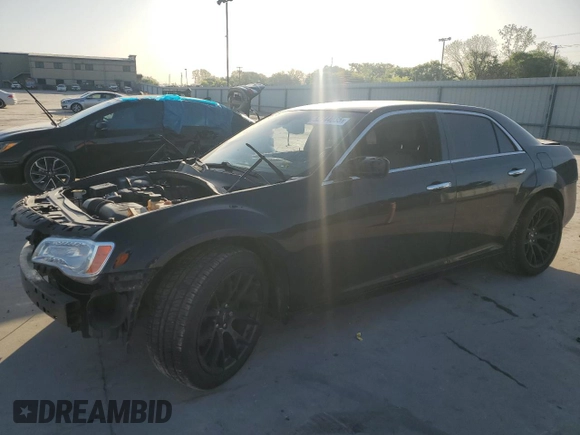 2012 Chrysler 300 with VIN 2C3CCAET3CH256182, listed as a Copart auction lot 52744035 with 153,490 mi miles and Salvage Title. Bid and sale history available at carsss.com. Image 1.