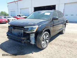 2024 Volkswagen Atlas 2.0T SE w/Technology with VIN 1V2HR2CA4RC577679, listed as a IAAI auction lot 42031792 with 26,026 mi miles. Bid and sale history available at carsss.com. Image 18.