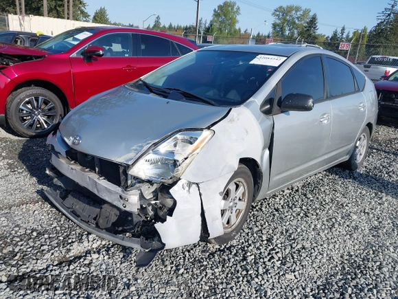 2005 Toyota Prius with VIN JTDKB20U853027020, listed as a IAAI auction lot 42084542 with 147,426 mi miles and . Bid and sale history available at DreamBid. Image 2.