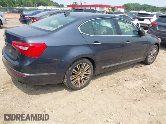 2014 Kia Cadenza Premium z VIN KNALN4D70E5129957, wystawiony jako IAAI lot #42410349 z przebiegiem 217 570 mil mil oraz . Historia ofert i sprzedaży dostępna na DreamBid. Obrazek 4.